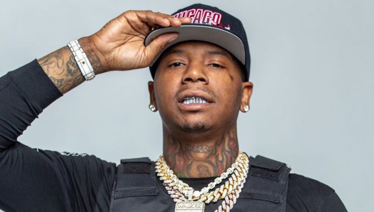 Moneybagg Yo throat and neck stage name tattoo