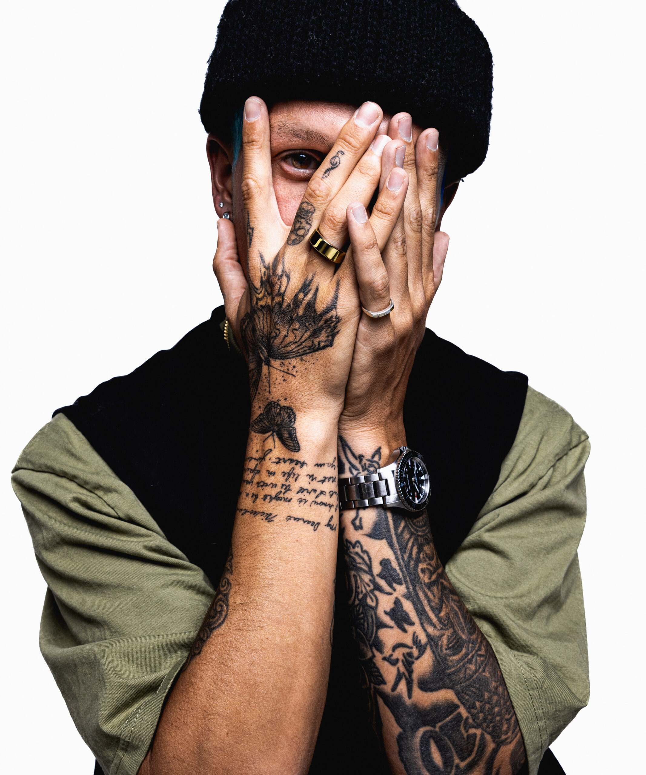 Nick Mayhugh hand butterfly and script tattoos from his tattoo tour