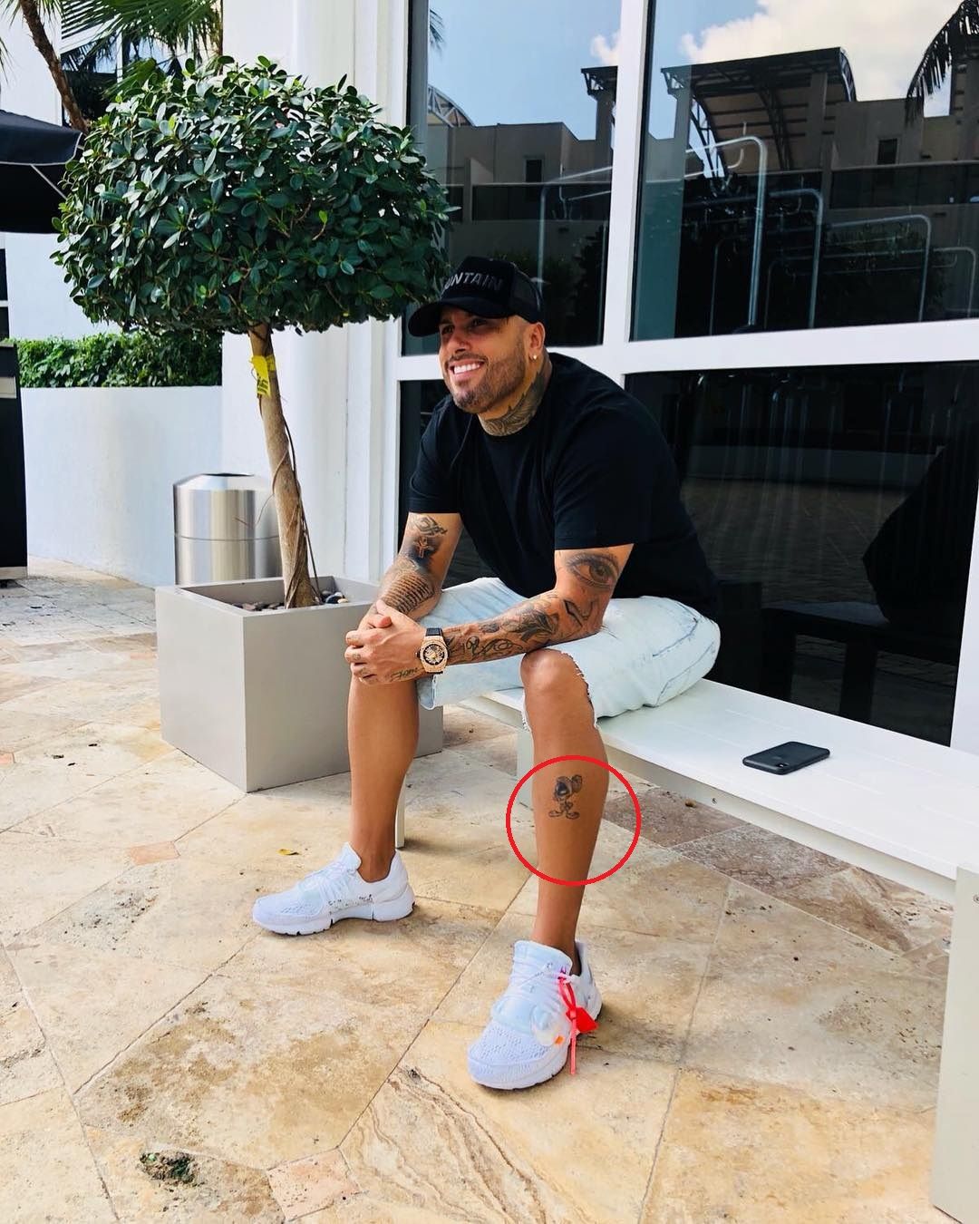 Nicky Jam Marvin the Martian leg tattoo