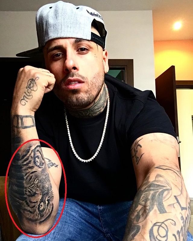 Nicky Jam tiger forearm tattoo