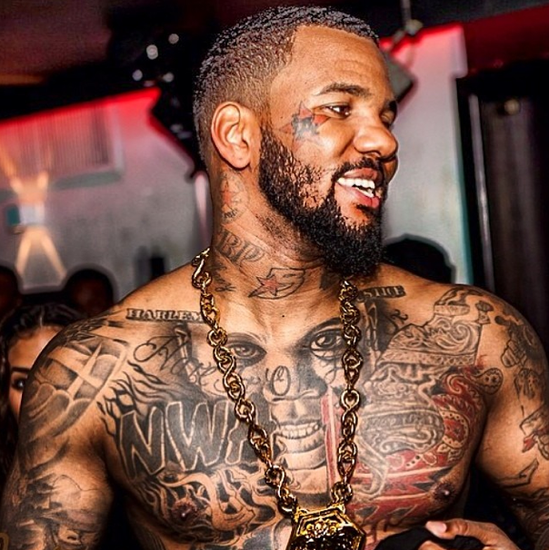The Game Obama chest portrait and surrounding tattoos