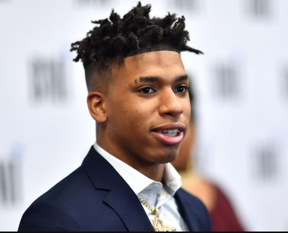 NLE Choppa NLE neck tattoo