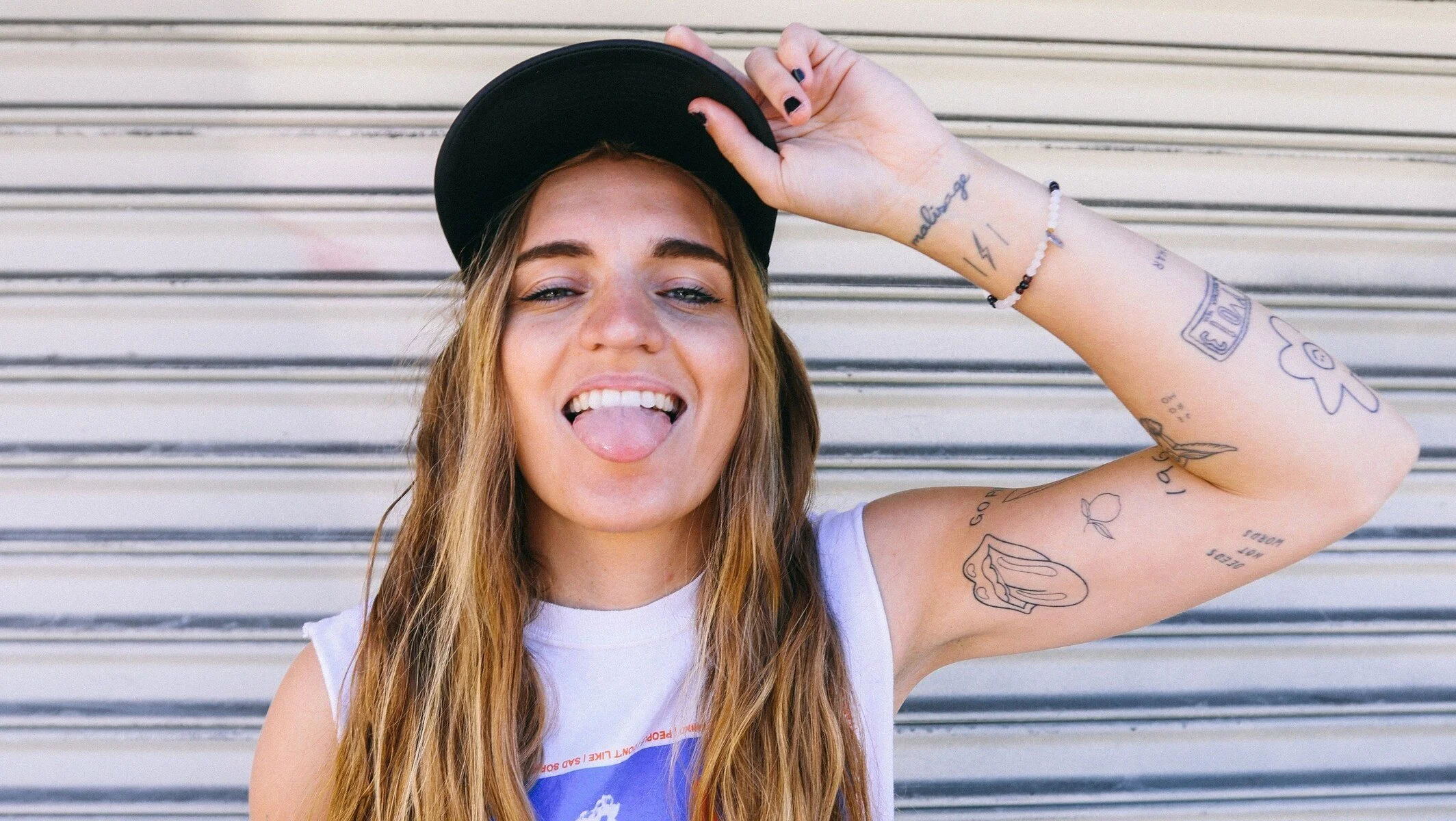 G Flip tattoos: separate musician portrait showing additional forearm and wrist details