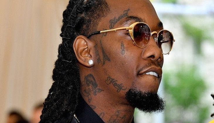 Offset’s family-name tattoos shown in a close-up face photograph.