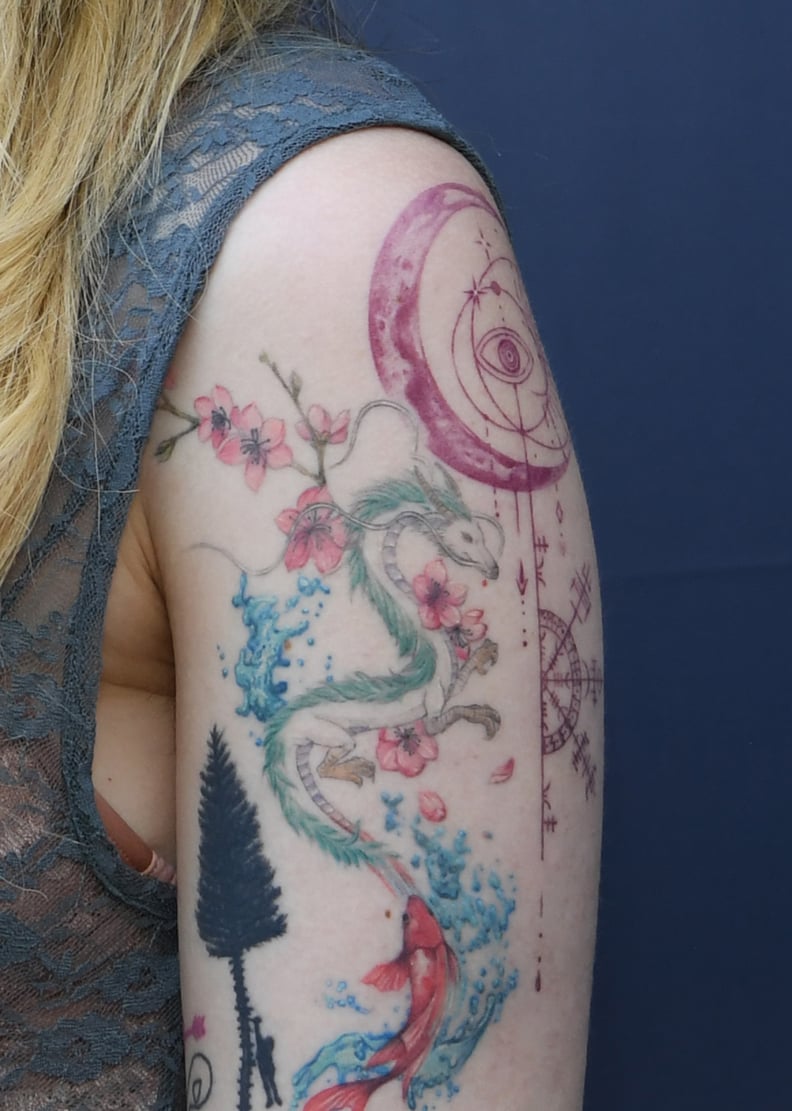 Paris Jackson crescent moon and dragon shoulder tattoos