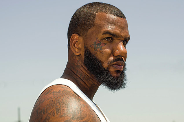 The Game smaller face neck chest and arm tattoos