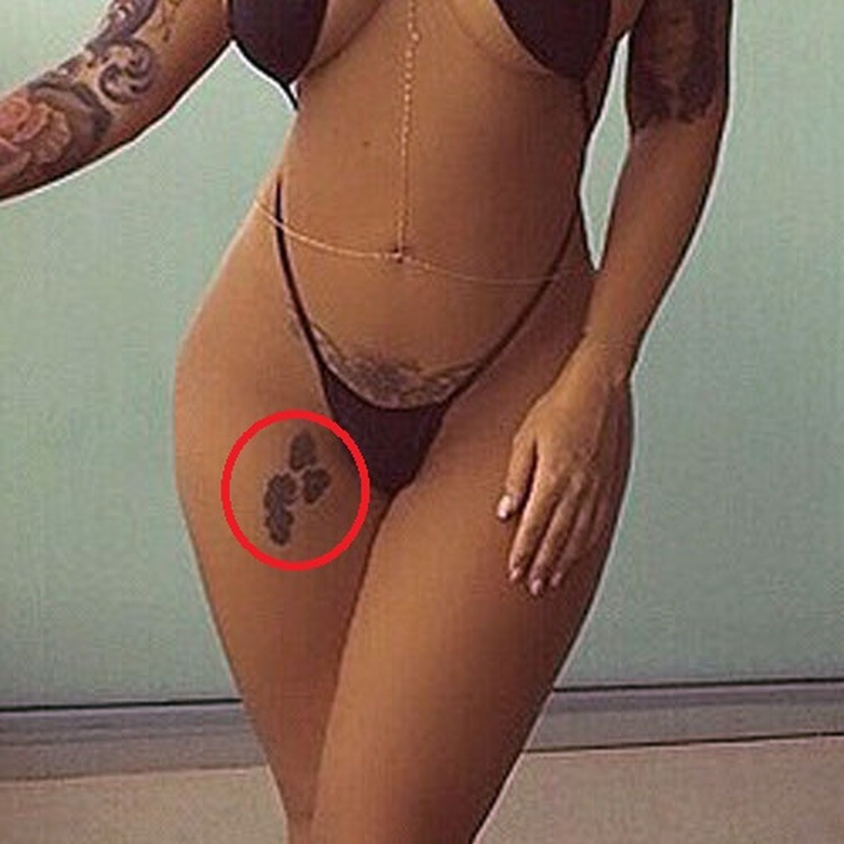 Amber Rose tattoos: paw tattoo
