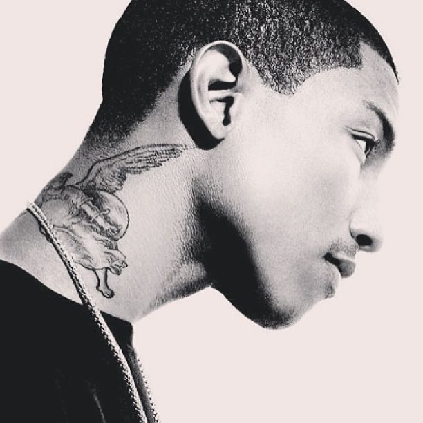 Pharrell Williams winged angel tattoo on the neck