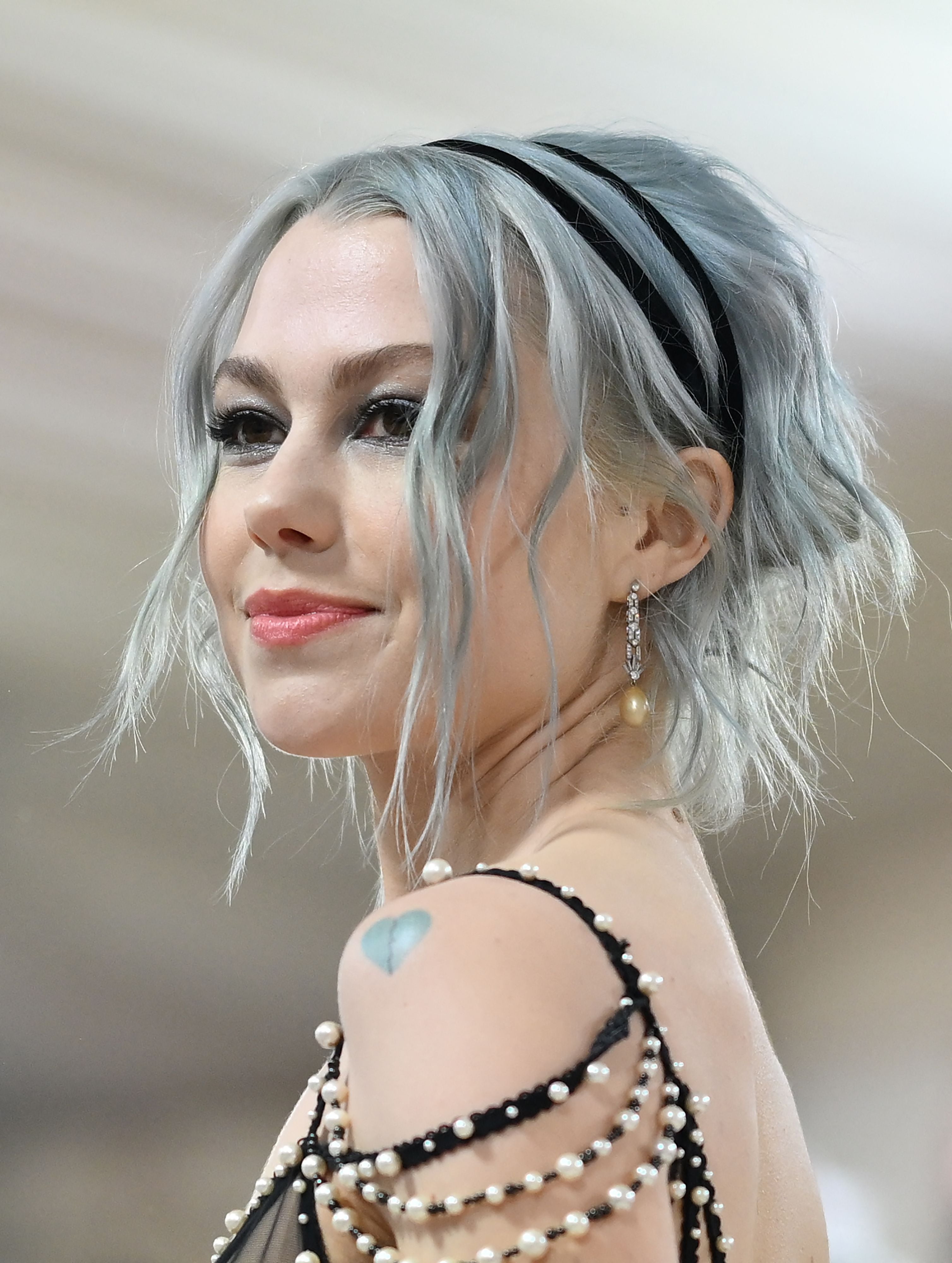 Phoebe Bridgers shoulder heart tattoo