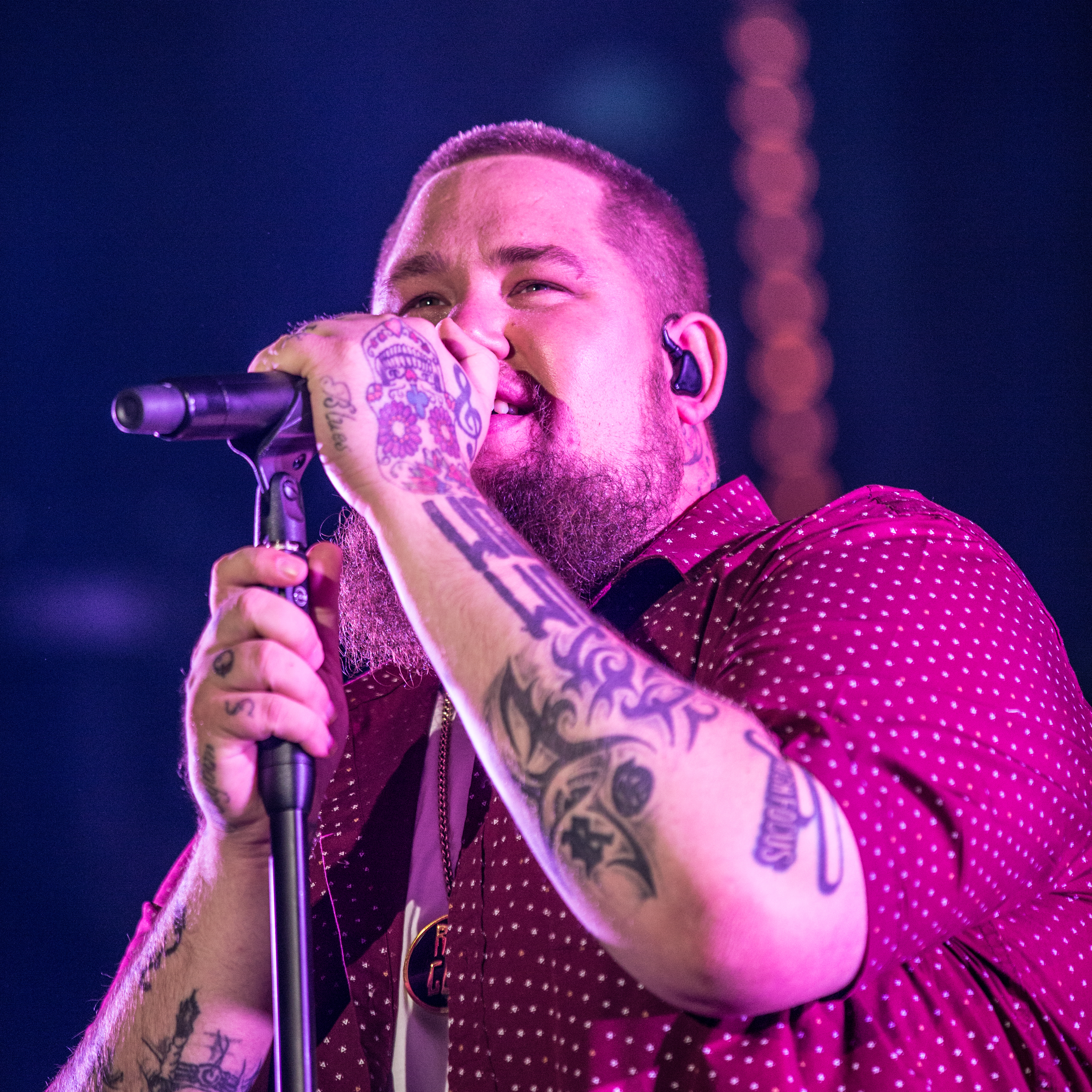 Rag’n’Bone Man face and forearm tattoos