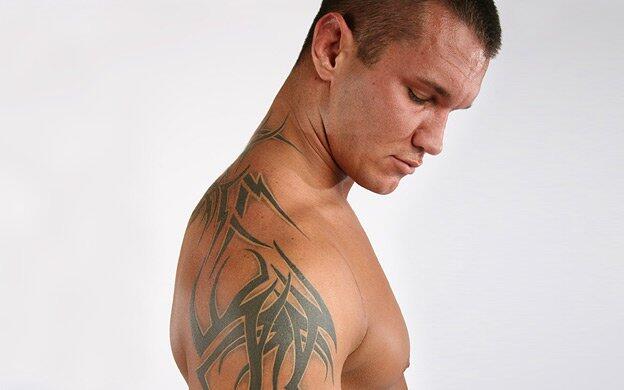 Randy Orton’s coloured rose tattoo