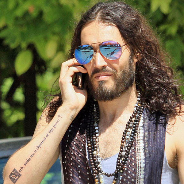 Russell Brand prayer of Saint Francis forearm tattoo close up