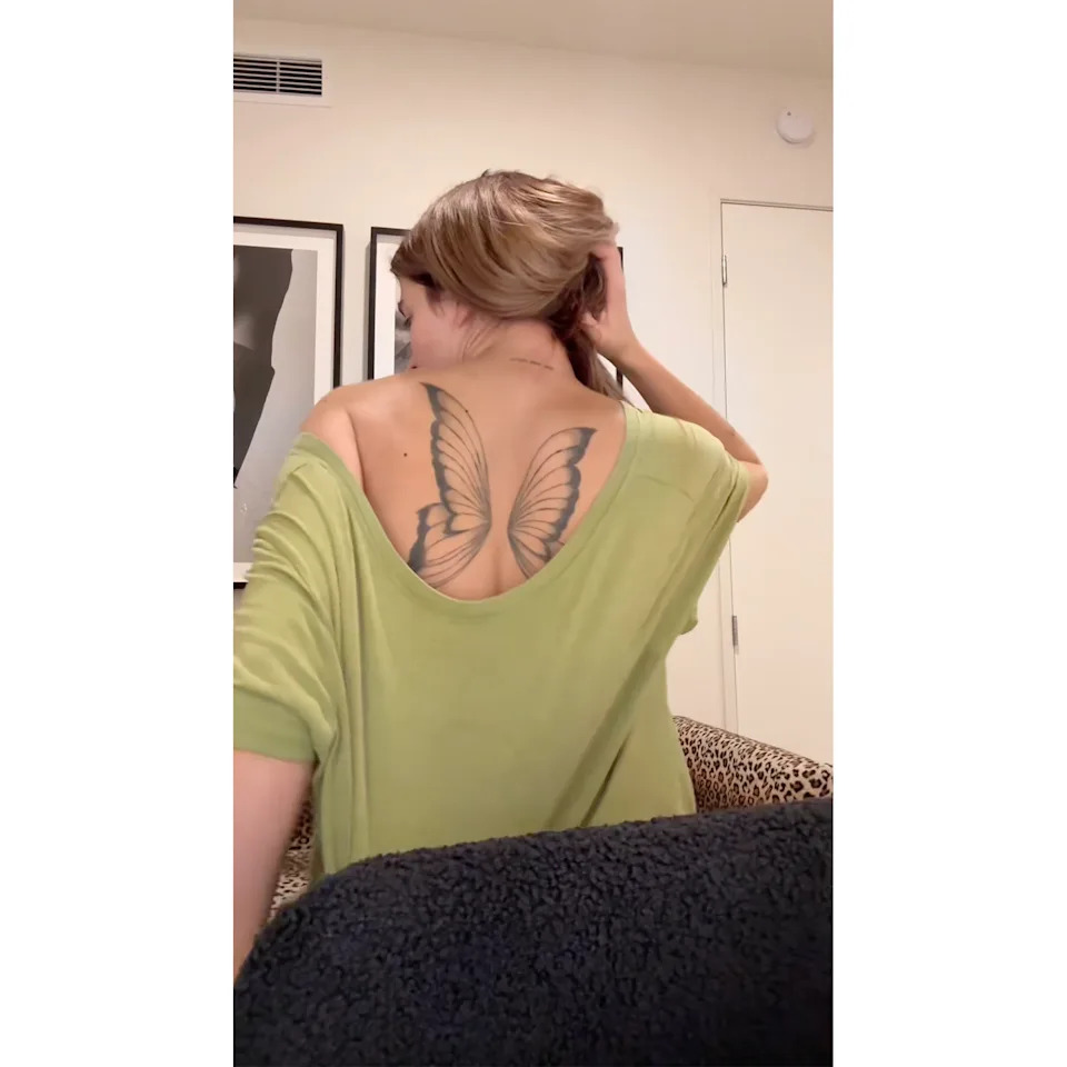 Sami Sheen butterfly wings back tattoo