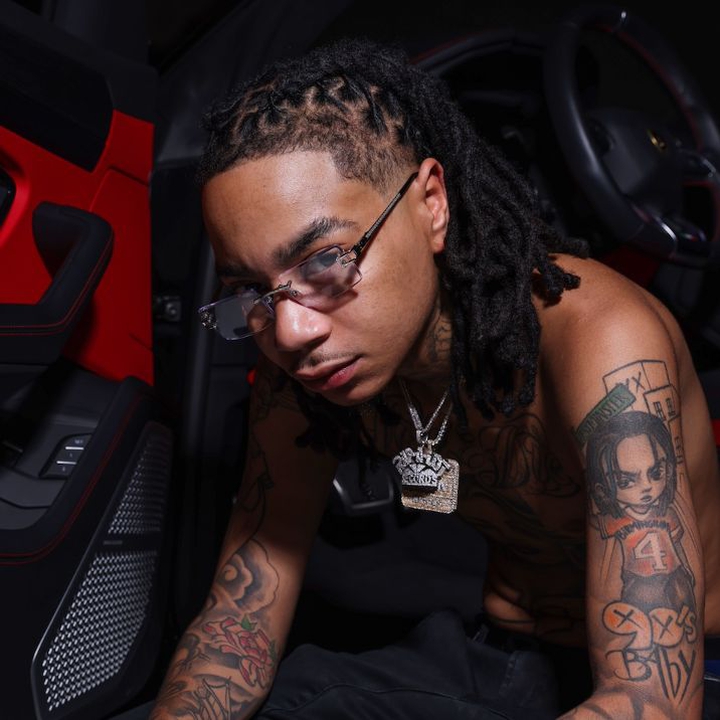 YBN Nahmir shirtless showing arm and neck tattoos