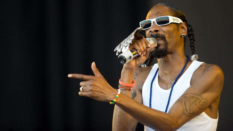 Snoop Dogg arm tattoo close-up