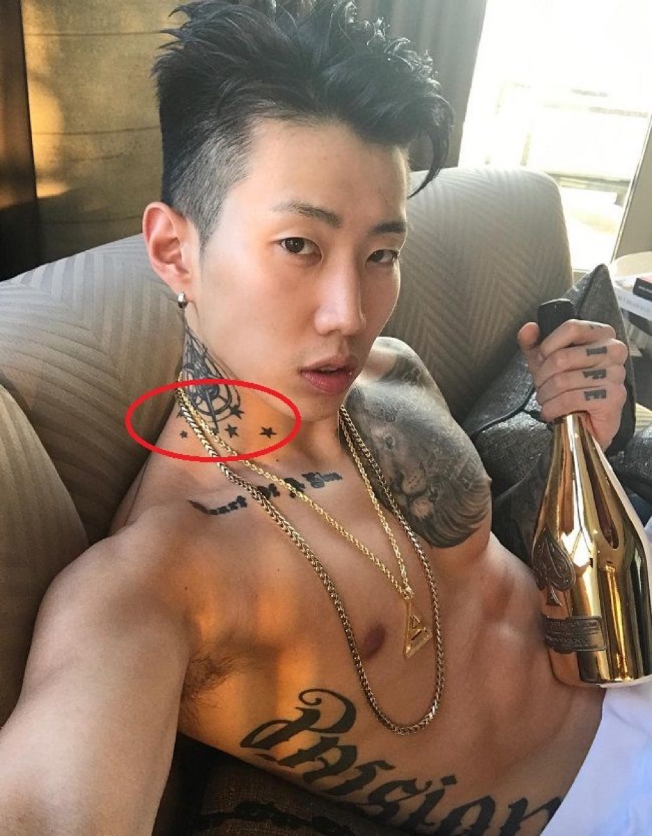 Jay Park tattoos: neck stars and compass tattoo group