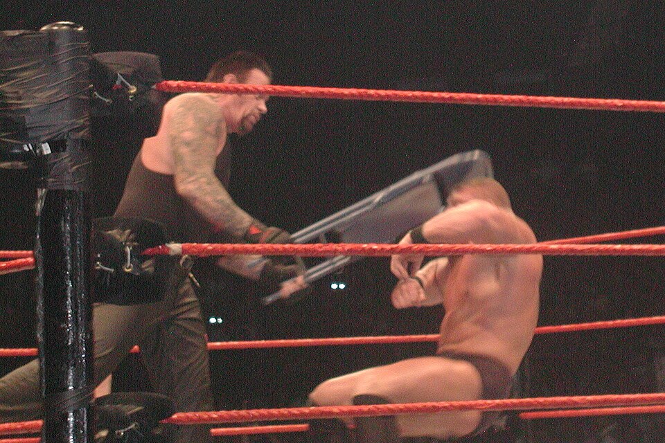 The Undertaker forearm tattoo