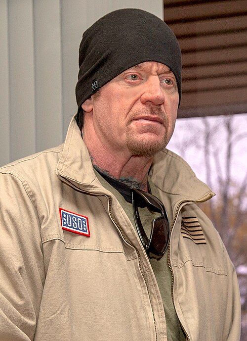 The Undertaker face and neck tattoos