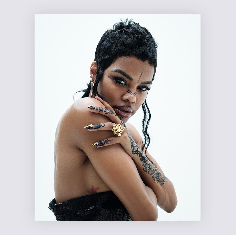 Teyana Taylor tattooed forearms portrait