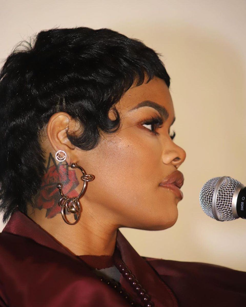 Teyana Taylor rose neck tattoo