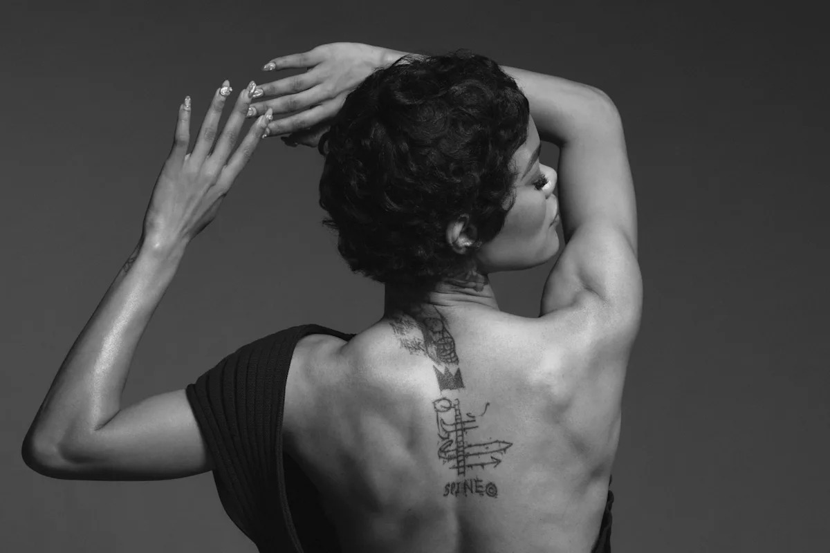 Teyana Taylor spine tattoo portrait
