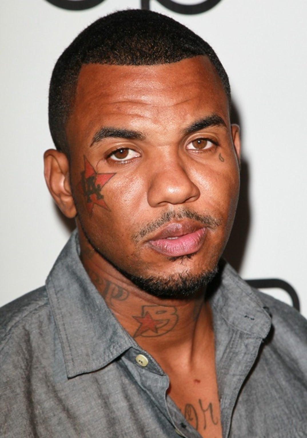 The Game red LA cheek tattoo and teardrop