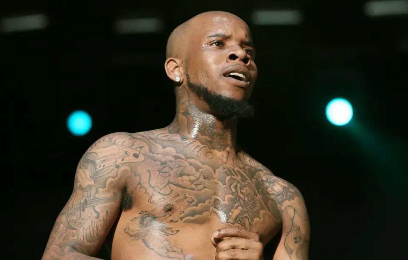 Tory Lanez stage chest tattoos
