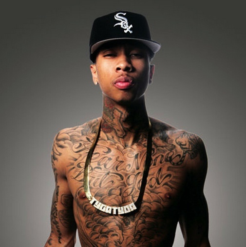 Tyga Fear None But God chest tattoo