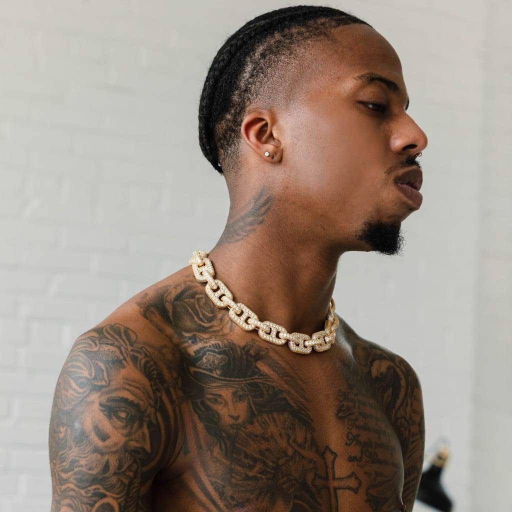 Tyga neck and hand tattoos