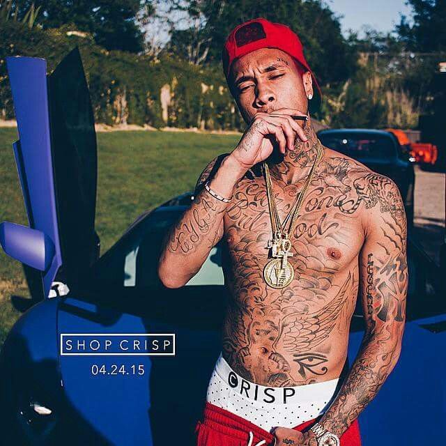 Tyga Vietnam inspired torso tattoos