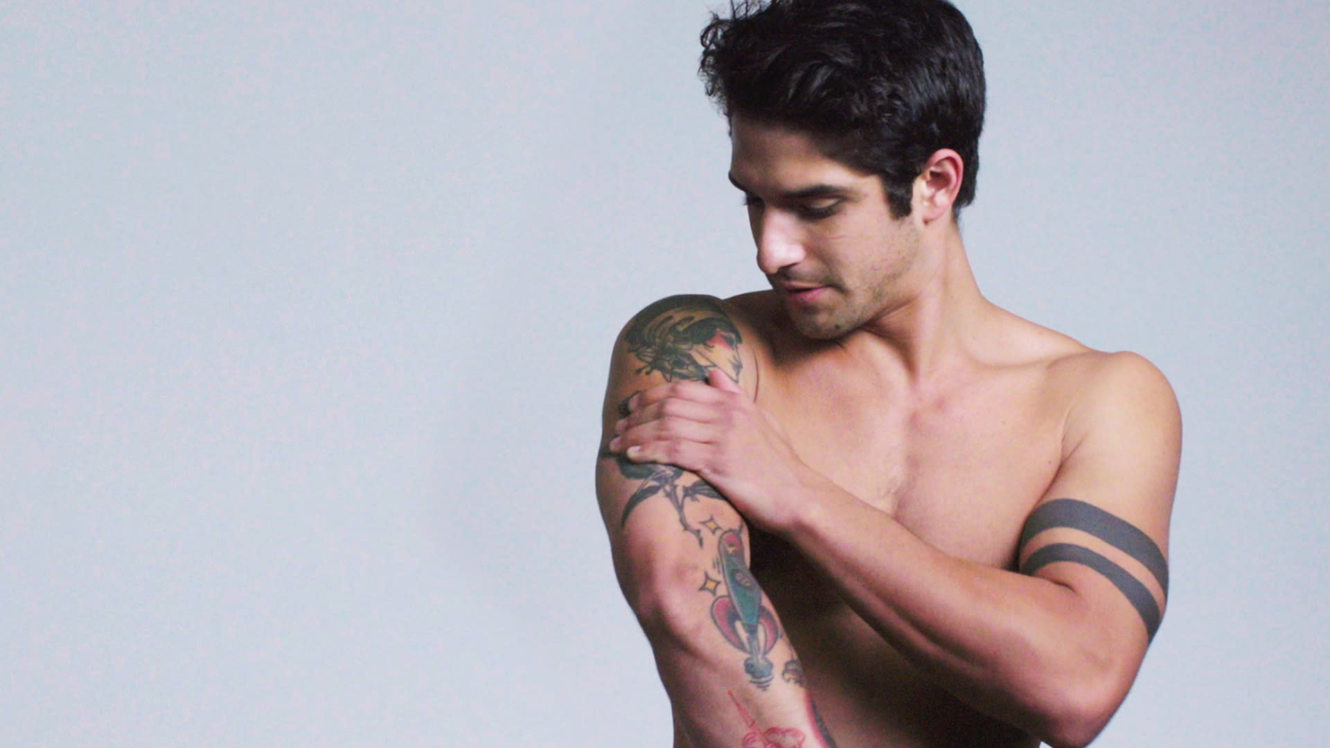 Tyler Posey shoulder and forearm tattoos