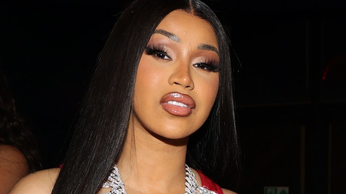 Cardi B tattoos: Cardi B Wave face tattoo