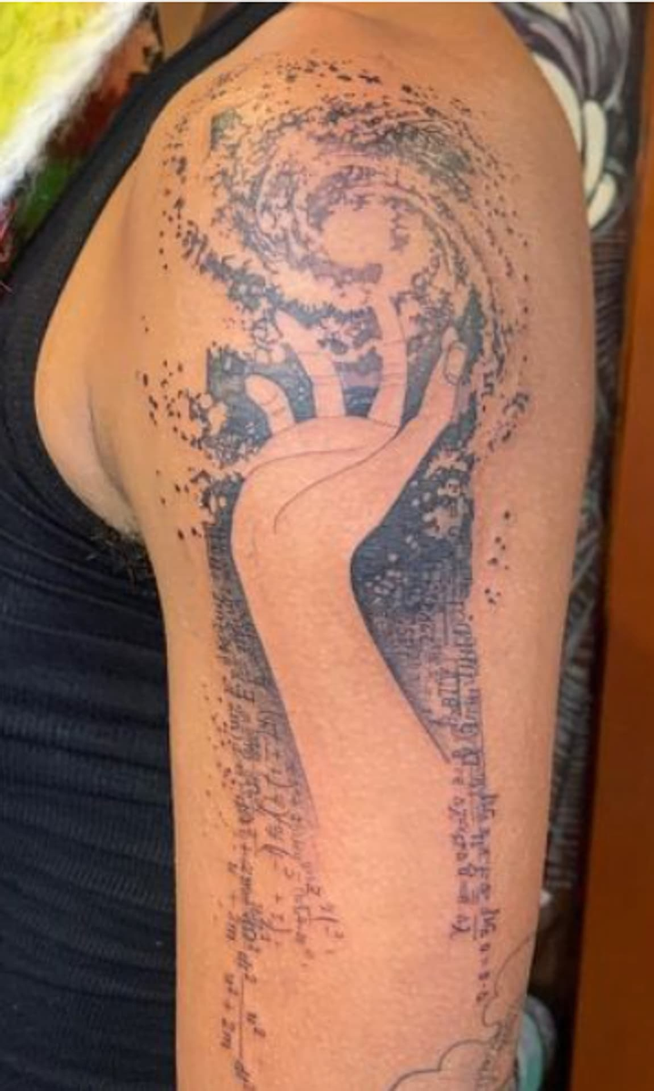Willow Smith galaxy arm tattoo