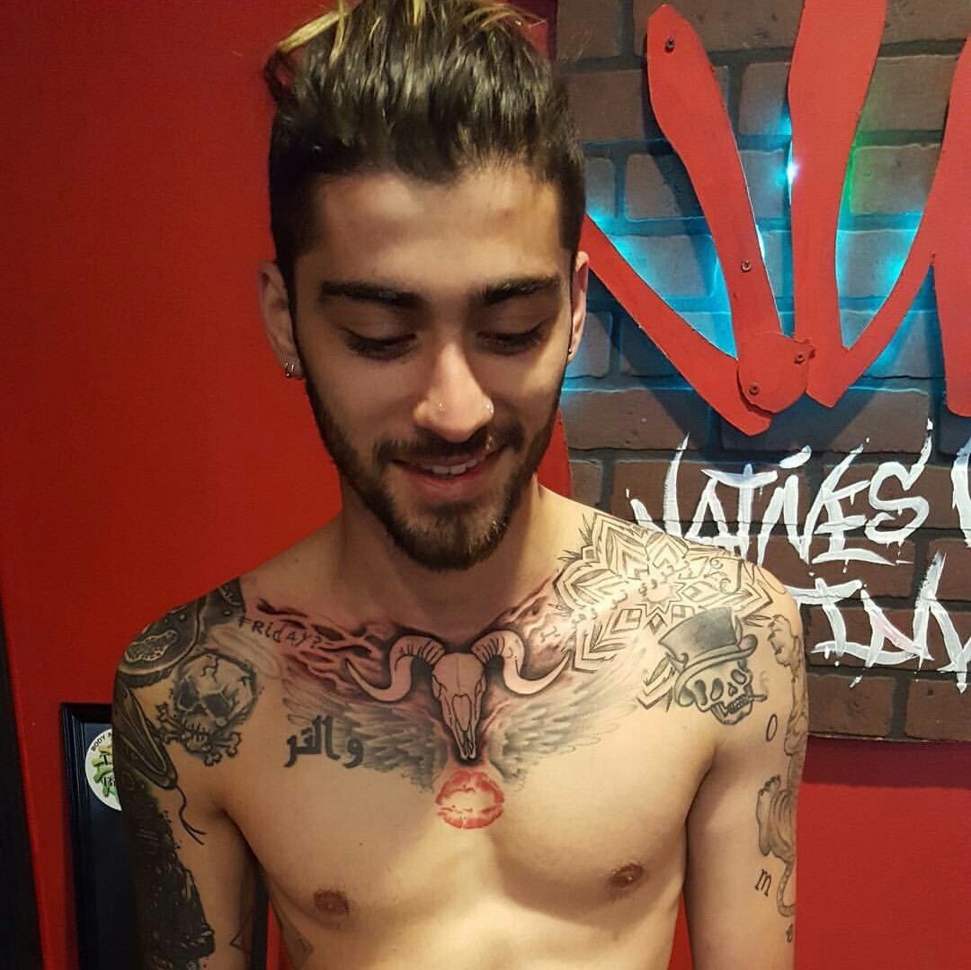 Zayn Malik Arabic Walter tattoo and ram skull chest tattoo