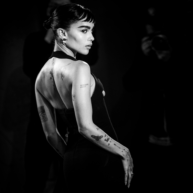 Zoe Kravitz showing the moon and star arm tattoo