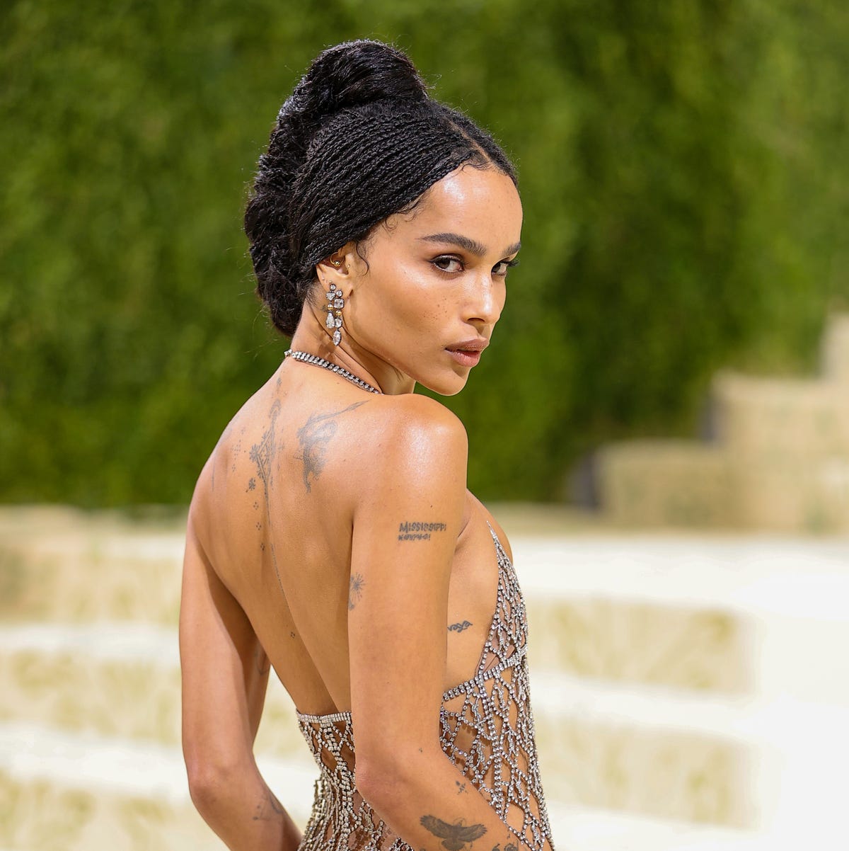 Zoe Kravitz showing the small markings along her spine